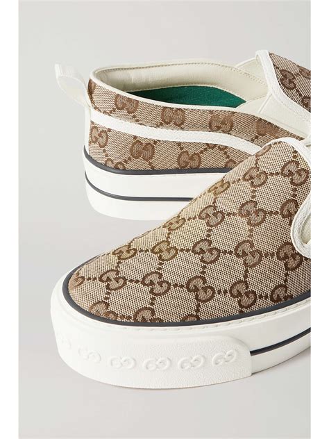 gucci canvas tennis shoes|cost of Gucci slides.